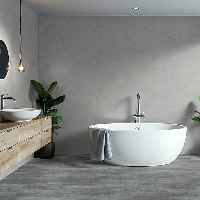 Revêt Wandpaneel SPC Wall - 600 x 300 mm, Grau - Das elegante Badezimmer zeigt eine moderne Badewanne, einen Waschtisch mit Aufsatzwaschbecken und eine stilvolle Beleuchtung.