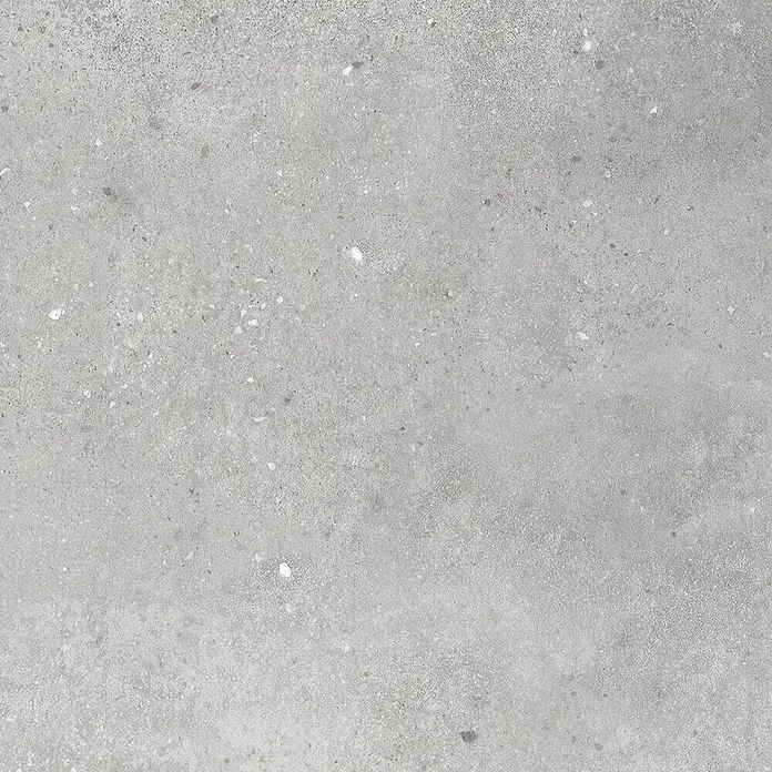 Revêt Wandpaneel SPC Wall - 1.200 x 600 mm, Beton Grau - Nahaufnahme einer grauen Betonbodenplatte mit feinen weißen Sprenkeln, ideal für moderne und industrielle Innenräume.