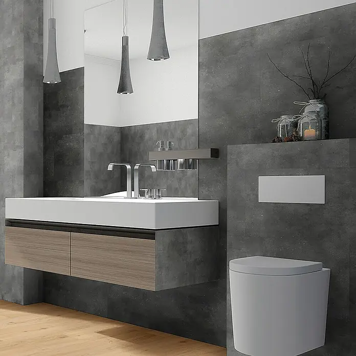 Revêt Wandpaneel SPC Wall - 1.200 x 600 mm, Beton Grau - Elegantes Badezimmer-Interieur mit modernem Waschtischunterschrank in Holzoptik, stilvoller Beleuchtung und einem wandhängenden WC für ein minimalistisches Design.
