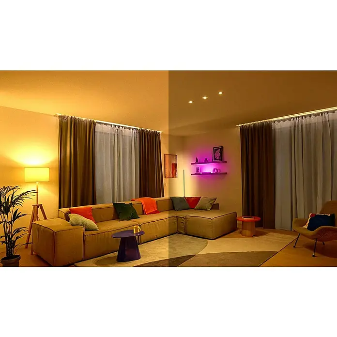 Philips Wiz Smart-LED-Lampe - E27, Dimmbar, Neutralweiß, 1.521 lm, 12,5 W, 1 Stk. - Ein gemütliches Wohnzimmer mit einem modularen Sofa, beleuchteten Regalen und stimmungsvoller Beleuchtung für ein einladendes Ambiente.