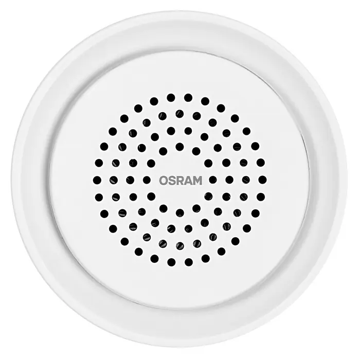 Osram Smart+ Alarmsirene - Innen, 90 dB, Netzbetrieben - Nahaufnahme einer runden, weißen LED-Lampe von Osram mit einem Lochmuster, das für eine gleichmäßige Lichtverteilung sorgt.