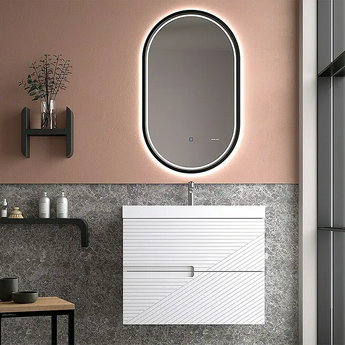Duplach Mueble bajo de lavabo Rimo - L x An x Al: 45 x 80 x 60 cm, Blanco - Elegante interior de baño con espejo iluminado sobre un moderno tocador blanco con líneas decorativas.