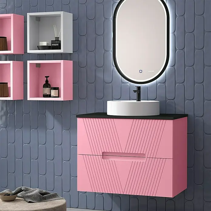 Duplach Mueble bajo de lavabo Istor - L x An x Al: 45 x 60 x 60 cm, Rosa - Un interior de baño moderno con un mueble de lavabo rosa, un espejo ovalado y estantes de pared.