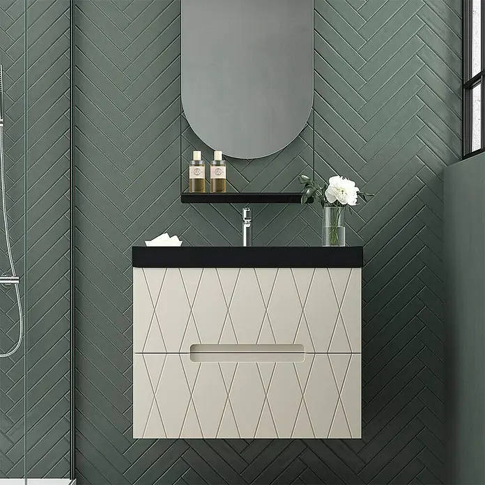 Duplach Mueble bajo de lavabo Nanda - L x An x Al: 45 x 80 x 60 cm, Beige - Un moderno lavabo de baño con un diseño elegante y un espejo ovalado, frente a una pared verde con patrón de espiga.