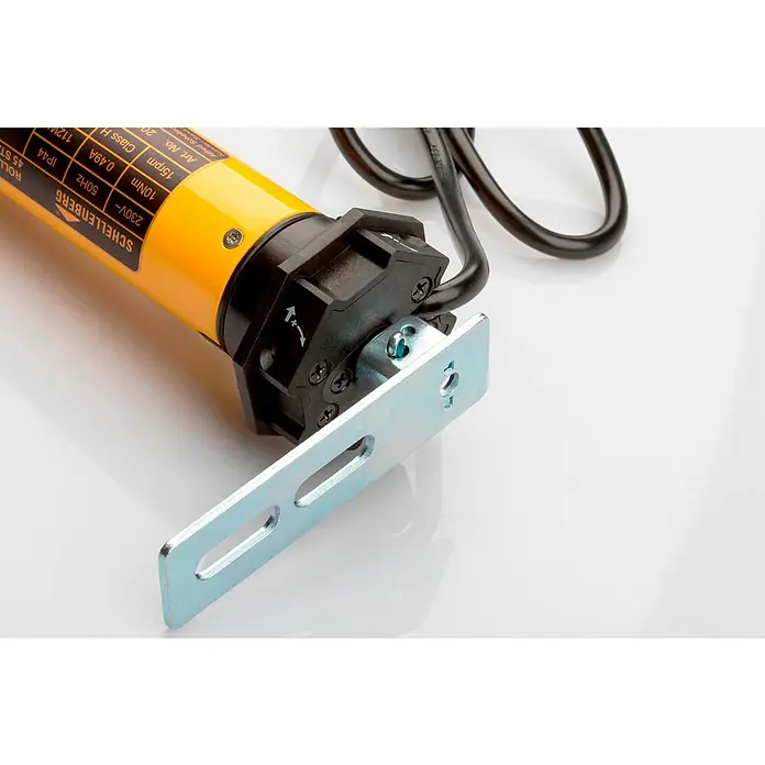 Schellenberg Rohrmotor Maxi Standard 10 - Max. Rollladenfläche: 4,2 m² bei Kunststoffrollläden, Einbaulänge: 500 mm, Zugkraft: 20 kg - Detailaufnahme eines Schellenberg Rolladenmotors mit gelbem Gehäuse und schwarzem Anschlusskabel.