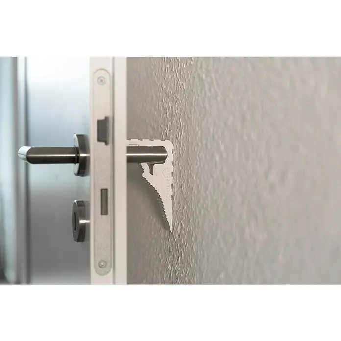 Schellenberg Tür- & Fensterstopper - Weiß - Bild einer Tür mit einem montierten Türstopper, der zwischen Türgriff und Wand angebracht ist.