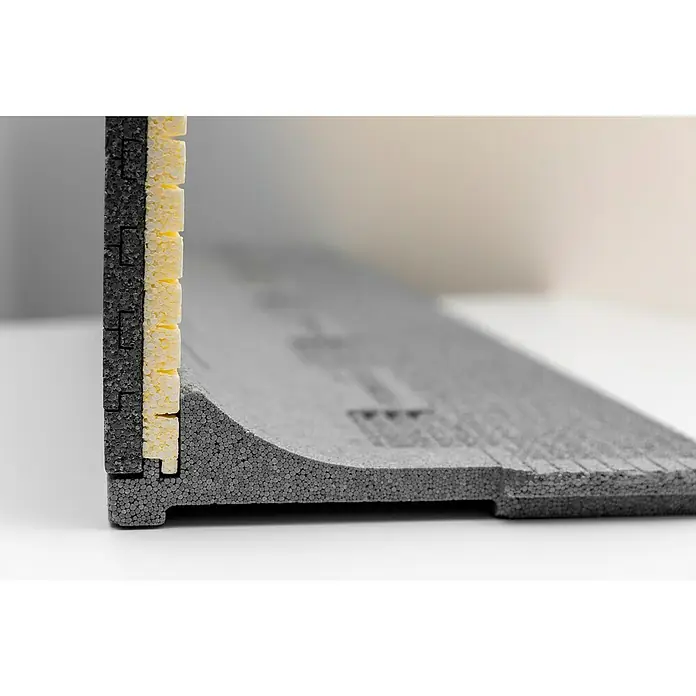 Schellenberg Rollladenkasten-Dämmmatte - 100 x 50 x 2,5 cm, Passend für: Große Rollladenkästen - Detailansicht einer mehrschichtigen Dämmplatte, die die Materialzusammensetzung und Konstruktion für Wärmeisolierung zeigt.