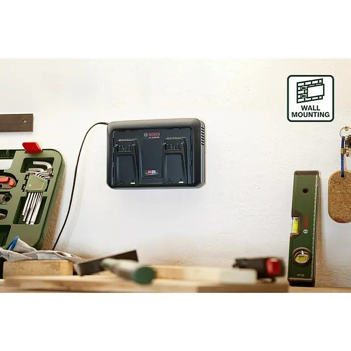 Bosch Akku-Ladegerät AL 2x18V-88 - 14,4 V - 18 V - Das Bosch AL 2x18V-88 Doppel-Ladegerät für Akkus der Power-for-All-Alliance an einer Wand montiert.