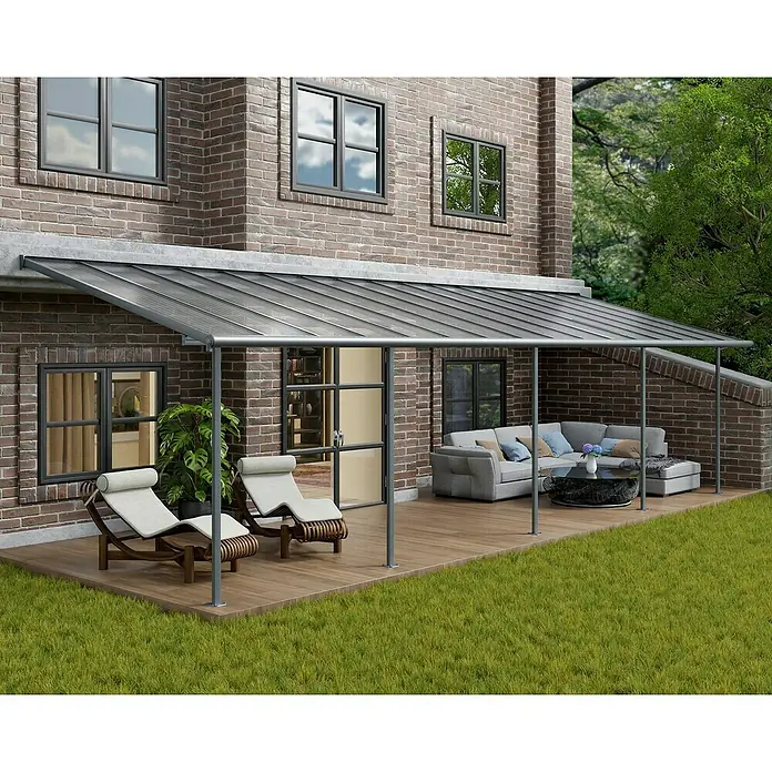 Palram – Canopia Terrassenüberdachung Sierra - B x T: 980 x 299 cm, Anthrazitgrau, Polycarbonat, Klar - Eine elegante Terrassenüberdachung mit grauem Rahmen und lichtdurchlässigem Dach, die Stil und Schutz im Außenbereich bietet.
