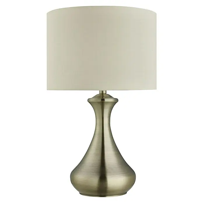 Searchlight Tischleuchte rund Touch - 60 W, 24 x 24 x 40 cm, Messing/ Ivory, E14 - Nahaufnahme einer eleganten Tischlampe mit einem cremefarbenen Lampenschirm und einem bronzefarbenen, tropfenförmigen Lampenfuß.