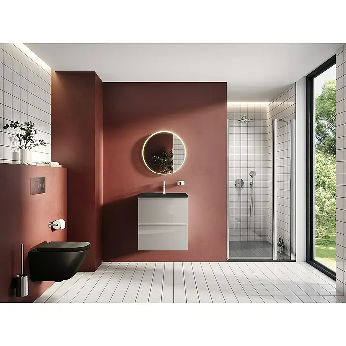 Riva Moon Waschtischunterschrank - B x T x H: 60 x 45,3 x 63,5 cm, Fume - Ein Badezimmer mit einer eleganten, grauen Waschtischkombination und einem runden Spiegel mit LED-Beleuchtung.