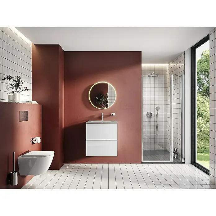 Riva Moon Waschtischunterschrank - B x T x H: 60 x 45,3 x 63,5 cm, Weiß - Ein modernes Badezimmer mit einer weißen Toilette, einem Waschbecken mit LED-beleuchtetem Spiegel und einer Duschkabine.