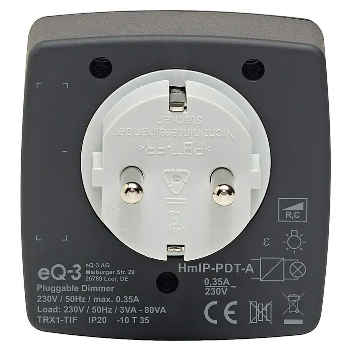 Homematic IP Funksteckdose Phasenabschnittdimmer HmIP-PDT-A - Anthrazit, 230 V - Nahaufnahme eines eQ-3-Dimmereinsatzes für Steckdosen, der für eine maximale Leistung von 0,35 A bei 230 V ausgelegt ist.