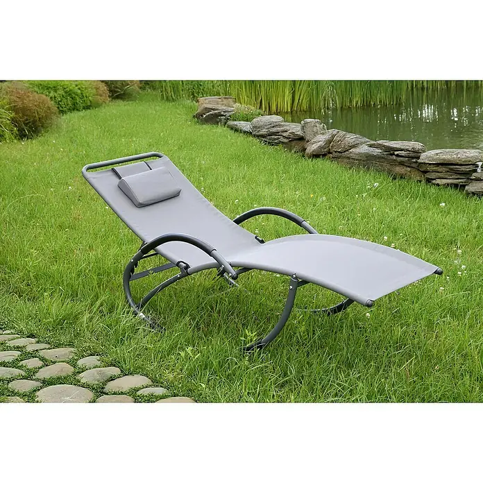 Garden Pleasure Gartenliege Siros mit Nackenkissen - Stahl, Anthrazit - Graue Sonnenliege mit Kopfkissen im Garten aufgestellt.