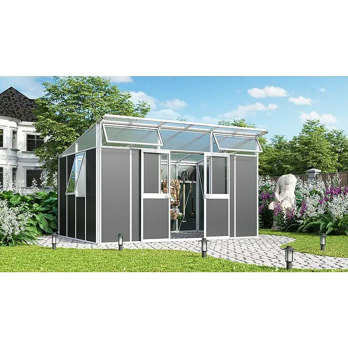 Vitavia Gerätehaus - Außenmaß inkl. Dachüberstand (B x T): 392,8 x 295 cm, Aluminium, Weiß/Anthrazit - Bild eines modernen Gewächshauses mit grauem Rahmen, das in einem gepflegten Garten steht und Platz für die Gartenarbeit bietet.