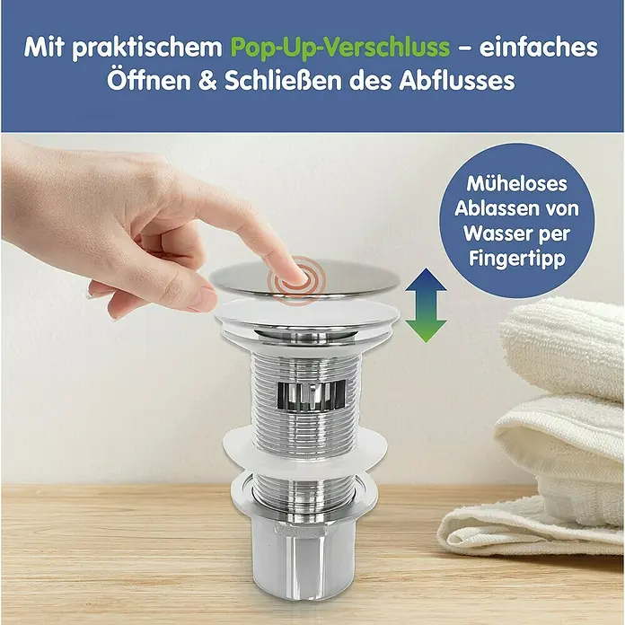 Ablaufventil - Durchmesser: 60 mm, Weiß/Chrom, Bad - Das Bild zeigt einen Pop-Up-Verschluss für einen Waschtischablauf mit einfacher Bedienung durch einen Fingertipp.