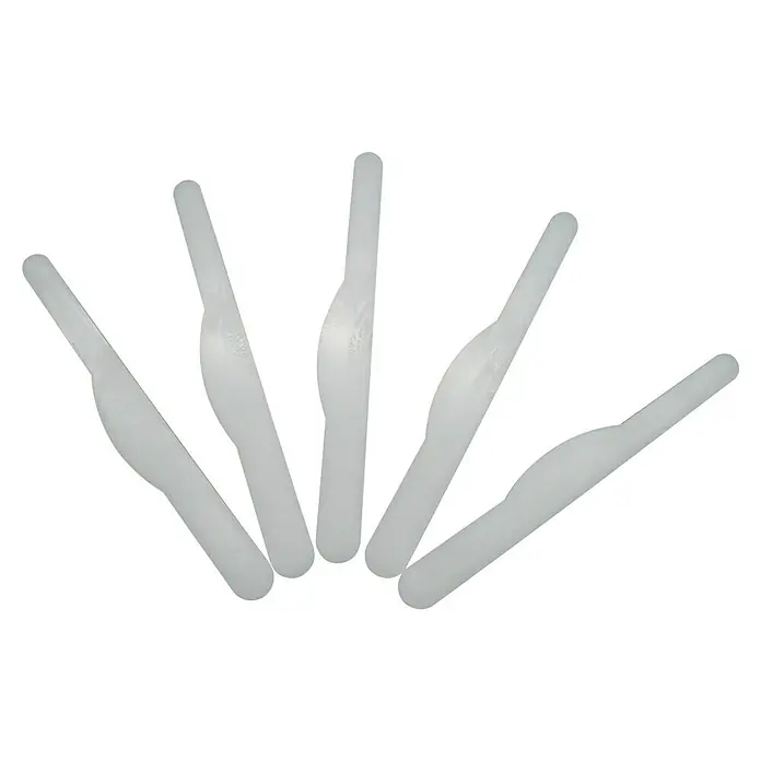 Heka Varilla de unión fija - 5 ud. - Primer plano de 5 espátulas bucales de plástico delgadas y transparentes dispuestas en forma de abanico, que ofrecen higiene desechable.