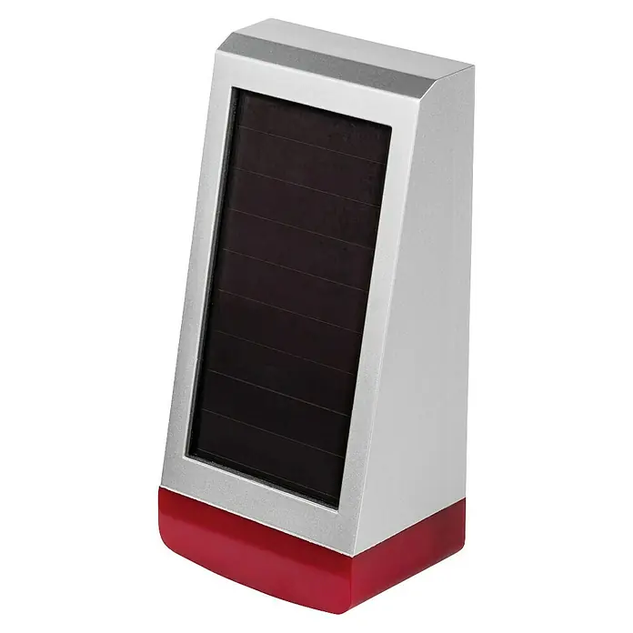 Homematic IP Alarmsirene HmIP-ASIR-O - Solarbetrieben, Alarmsignal: 100 dB, 8,7 x 11 x 23 cm - Nahaufnahme einer silbernen Solarleuchte mit rotem Sockel. Perfekt für Garten, Terrasse oder Balkon und spendet umweltfreundliches Licht.