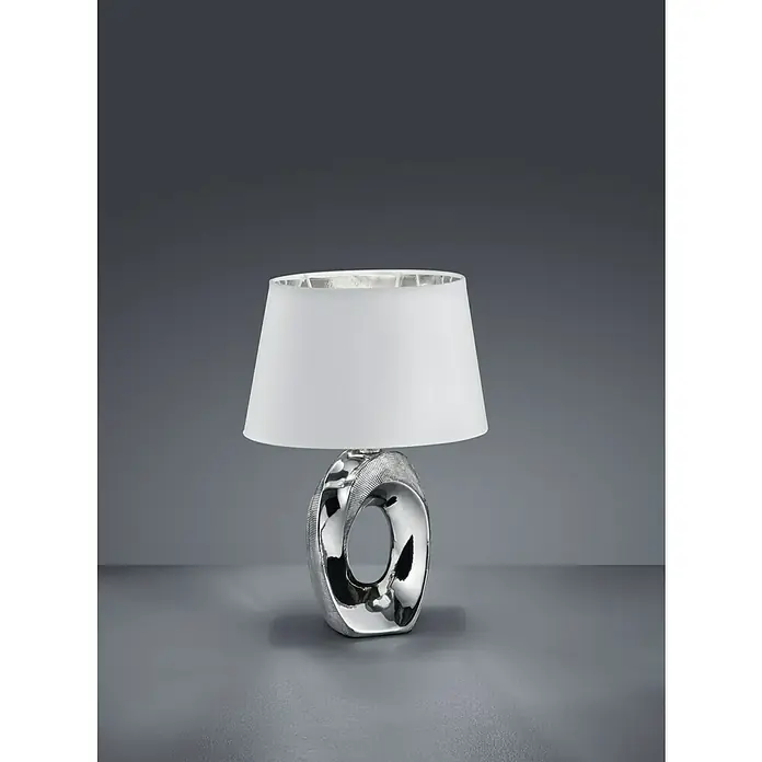 Trio Lighting Lámpara de sobremesa Taba - 40 W, L x An x Al: 23 x 18 x 33 cm, Plateado, E14 - Elegante lámpara de mesa con una base plateada en forma de anillo y una pantalla blanca sencilla para una iluminación elegante.