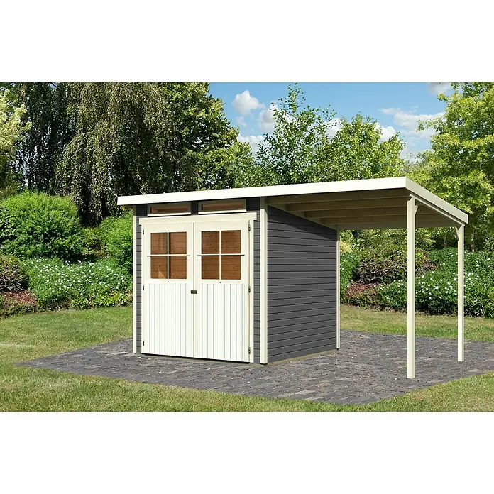 Karibu Gartenhaus Glücksburg - Außenmaß inkl. Dachüberstand (B x T): 415 x 236 cm, Holz, Terragrau, Grundfläche: 4,45 m² - Ein graues Gartenhaus mit Doppeltür und einem integrierten Carport auf einem gepflasterten Untergrund.