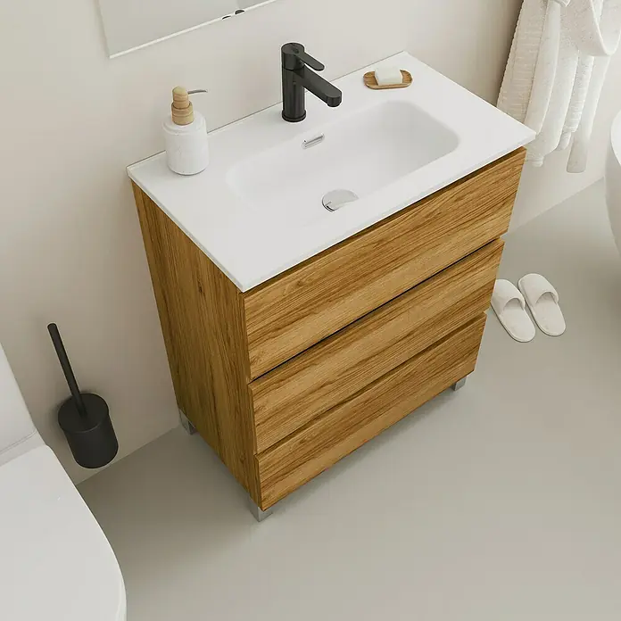 Conjunto de mueble de baño Inter F39 - Ancho: 70 cm, Roble, 3 pzs. - Un moderno mueble de baño de madera con un lavabo sobre encimera blanco y un grifo negro para un baño elegante.