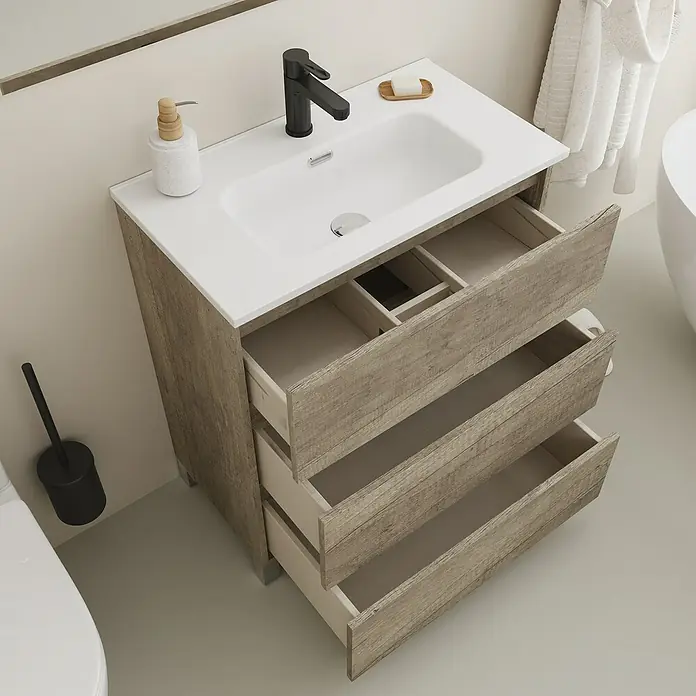 Conjunto de mueble de baño Inter F39 - Ancho: 70 cm, Nebraska, 3 pzs. - Mueble de baño con tres cajones abiertos, encimera blanca y grifo negro moderno que muestra un amplio espacio de almacenamiento.
