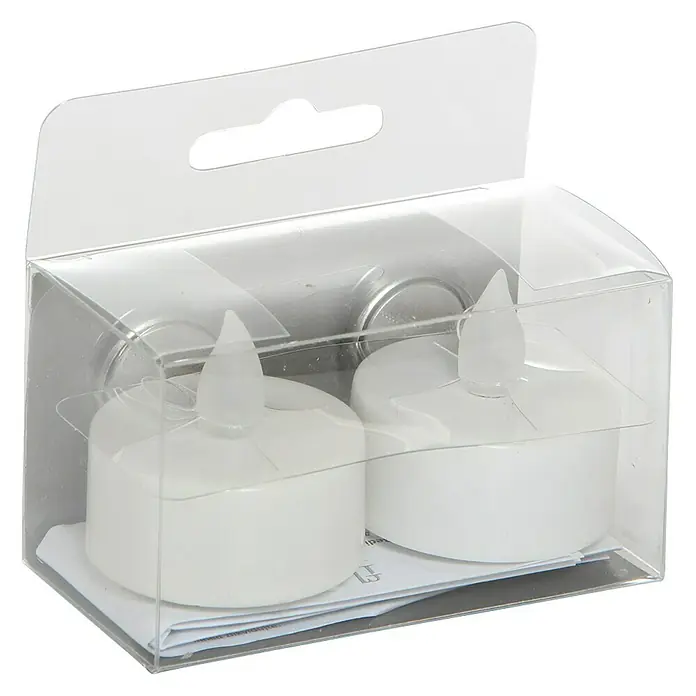 Flower Power LED-Teelicht - Ø x H: 3,8 cm x 3,5 mm, Weiß, 2 Stk. - Nahaufnahme einer transparenten Verpackung mit zwei weißen, elektronischen Teelichtern, die eine gemütliche Atmosphäre schaffen.