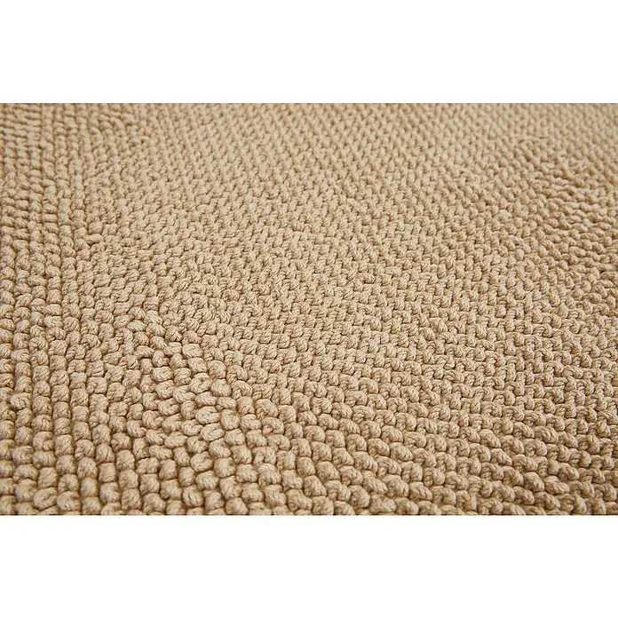 Badteppich Atlanta - 60 x 100 cm, Beige, 100% Baumwolle - Detailaufnahme eines beigen Teppichs mit Schlaufenstruktur, der eine weiche und komfortable Textur für das Badezimmer bietet.
