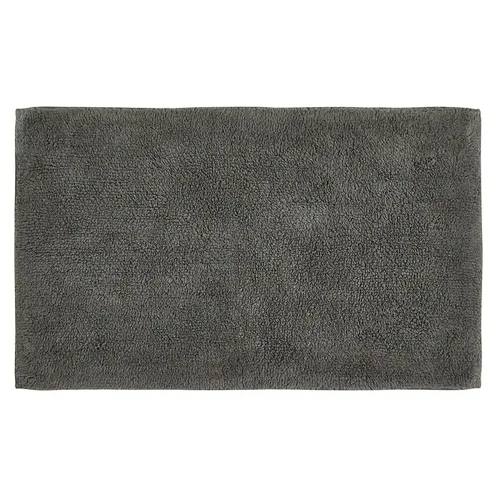 Badteppich Ibiza - 60 x 100 cm, Anthrazit, 100% Baumwolle - Eine graue, flauschige Badematte. Die Textur ist weich und einladend, ideal für ein Badezimmer.