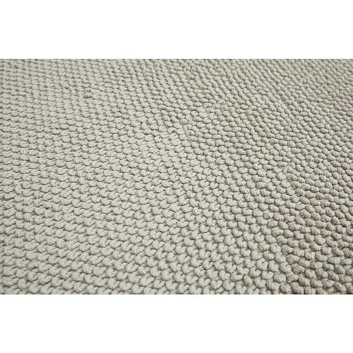 Badteppich Atlanta - 60 x 100 cm, 100% Baumwolle - Nahaufnahme eines beigen Badteppichs mit einer dichten, schlingenförmigen Textur, die eine weiche und saugfähige Oberfläche für den täglichen Gebrauch bietet.