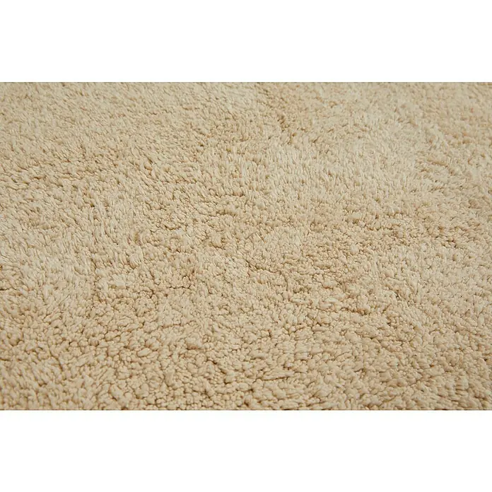 Badteppich Ibiza - 50 x 80 cm, Beige, 100% Baumwolle - Detailaufnahme eines beigen, flauschigen Teppichs, der eine weiche und einladende Textur zeigt. Ideal für Komfort und Wärme im Raum.