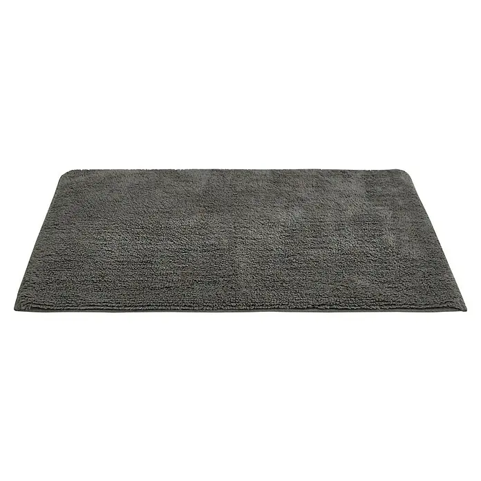 Badteppich Ibiza - 60 x 100 cm, Anthrazit, 100% Baumwolle - Ein rechteckiger, grauer Teppich mit flauschiger Textur, ideal als Badematte oder für andere Wohnbereiche. Der Teppich bietet Komfort und Stil.