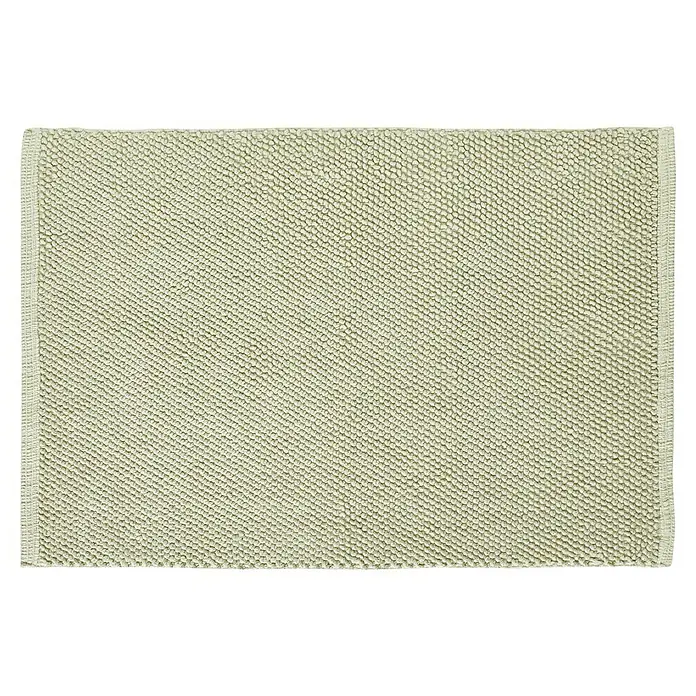 Badteppich Atlanta - 60 x 100 cm, Salbei, 100% Baumwolle - Nahaufnahme eines beigen Badezimmerteppichs mit einer feinen, strukturierten Oberfläche und einer schlichten, unaufdringlichen Ästhetik.
