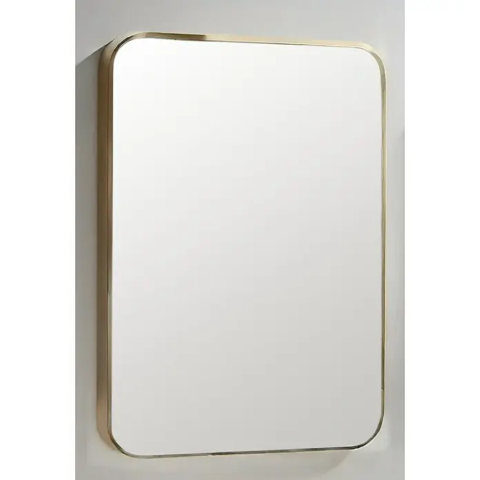 Espejo de pared Ovalado Zen - 100 x 165 cm, Oro - Un espejo rectangular con esquinas redondeadas y un fino marco dorado. El espejo está montado en una pared clara.