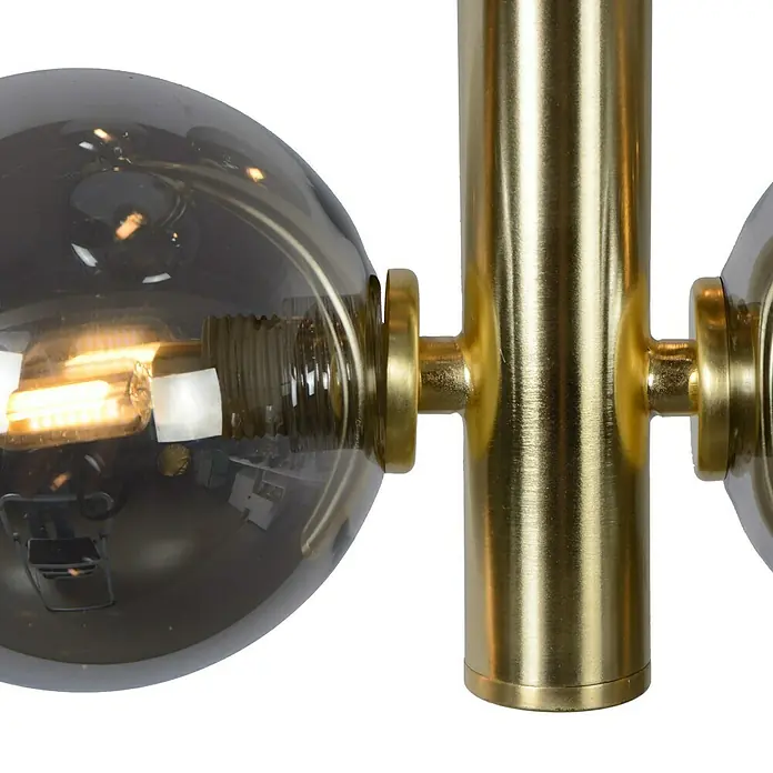 Lucide Tycho Pendelleuchte - L x B x H: 25,5 x 25,5 x 150 cm, Gold - Nahaufnahme einer goldenen Lampe mit grauen Glühbirnen, die ein warmes Licht ausstrahlen und eine elegante Atmosphäre schaffen.