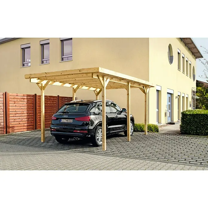 Carport - Einzelcarport - Ein Carport aus Holz schützt ein schwarzes Auto vor Witterungseinflüssen. Die Konstruktion fügt sich nahtlos in die Hausumgebung ein.
