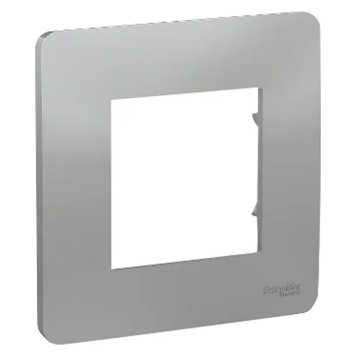 Schneider Electric New Unica Marco Studio - Aluminio, Modelo de mecanismos: x 1, Plástico, Instalar - Primer plano de una placa de cubierta plateada de Schneider Electric, diseñada para interruptores de luz y enchufes modernos.