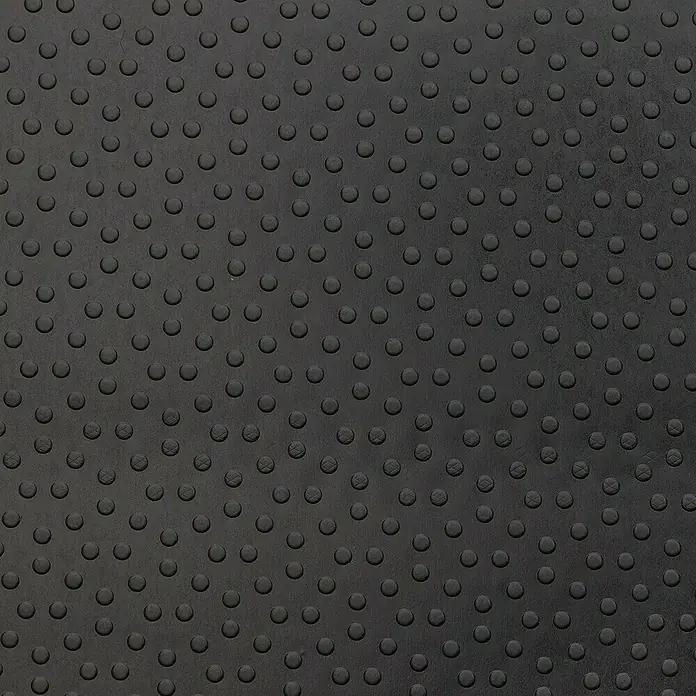 Floordirekt Läufer Dots - 120 x 50 cm, Schwarz - Nahaufnahme einer schwarzen, genoppten Gummioberfläche, ideal für rutschfeste Böden oder Texturen.