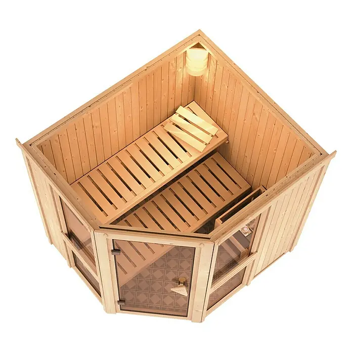 Karibu Elementsauna Amelia 1 - Mit 9 kW Bio-Ofen mit externer Steuerung, Ohne Dackranz, L x B x H: 196 x 170 x 192 cm - Aufnahme eines hellen Ecksaunabereichs mit transparenten Wänden, einer Glastür und Holzbänken.