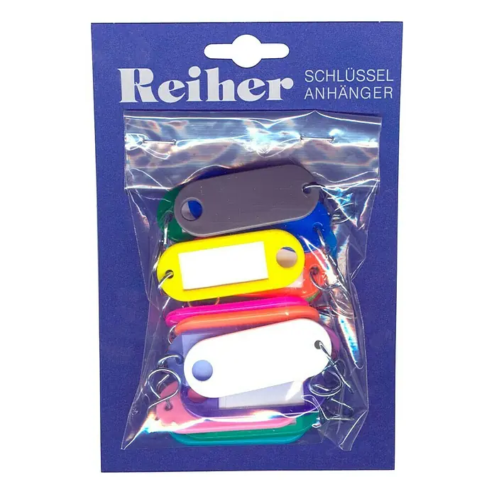 Schlüsselanhänger20 Stk., Kunststoff - Farbig sortierte Schlüsselanhänger von Reiher, verpackt in einer durchsichtigen Plastiktüte mit blauem Karton. Ideal zur Kennzeichnung von Schlüsseln.