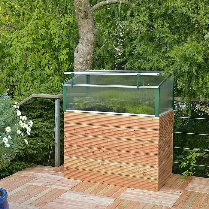 Hochbeet - 102 x 57,5 x 72 cm, Holz, Natur - Dieses Bild zeigt ein Hochbeet aus Holz und Glas, ideal für den Anbau von Pflanzen auf einer Terrasse oder im Garten.