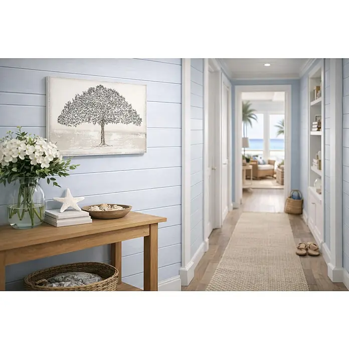 Armario de contadores Árbol virutas - Hojas, 50 x 35 cm, Crema - Pasillo acogedor con una mesa de madera decorada con flores, una estrella de mar y conchas, con una impresión artística de un árbol en la pared azul claro.