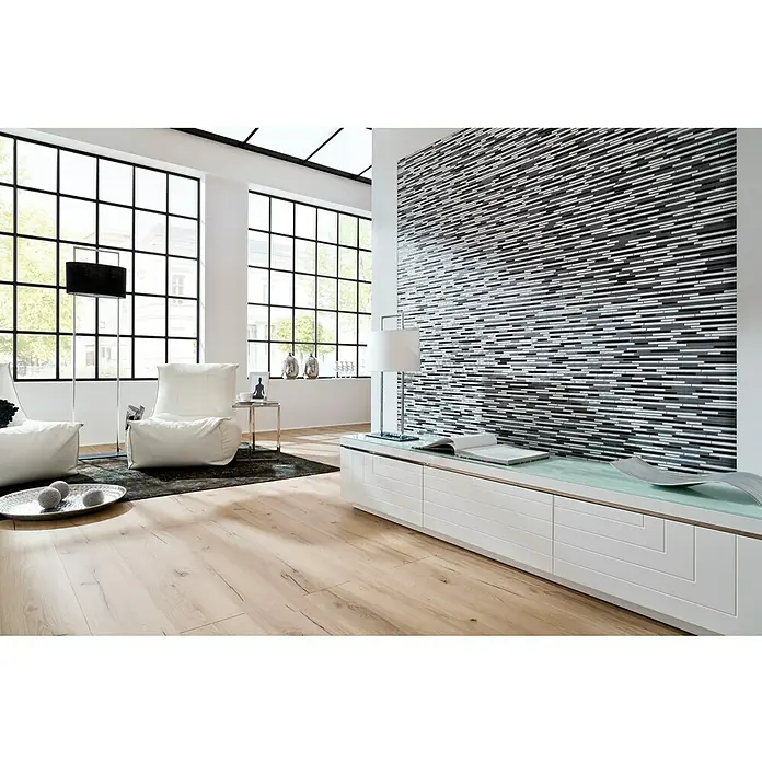 Mosaikfliese Brick XAM A881 - 29,8 x 31,8 cm, Grau, Matt - Ein helles Wohnzimmer mit einem weißen TV-Schrank mit einer modernen Mosaikwand im Hintergrund, die dem Raum eine stilvolle Note verleiht.