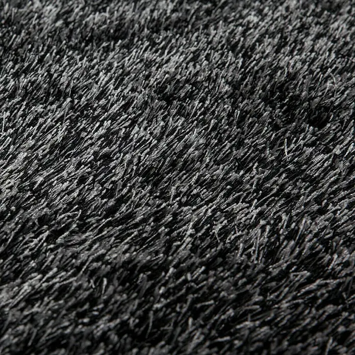 Kayoom Hochflorteppich DiamondAnthrazit, 290 x 200 cm, 100 % Polyester - Nahaufnahme eines luxuriösen, anthrazitfarbenen Hochflorteppichs, der Weichheit und Komfort ausstrahlt. Ideal für Wohnräume.