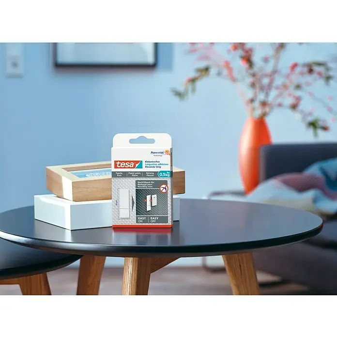 Tesa Powerstrips Tira autoadhesiva - Apto para: Paredes pintadas, Carga soportada: 0,5 kg, 9 ud. - Enfoque en las tiras adhesivas Tesa Powerstrips para papel pintado y yeso, con una capacidad de hasta 0,5 kg. Ideal para decoraciones ligeras.