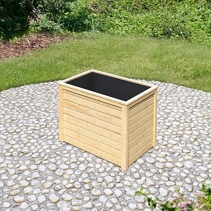 Karibu Hochbeet - 98 x 65 x 64 cm, Holz, Natur - Bild eines rechteckigen Pflanzgefäßes aus hellem Holz mit schwarzem Einsatz auf einem Steinterrassenbereich im Freien.