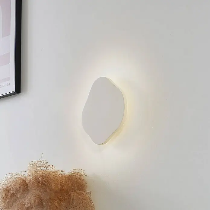 Lindby Wandleuchte Nielson - creme / amber