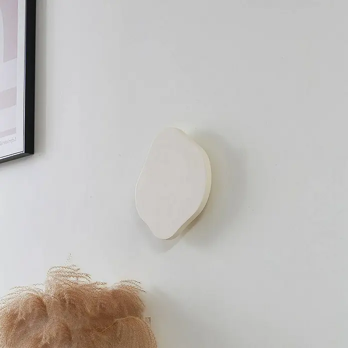 Lindby Wandleuchte Nielson - creme / amber