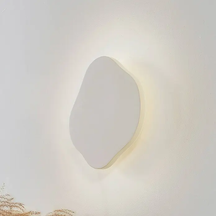 Lindby Wandleuchte Nielson - creme / amber