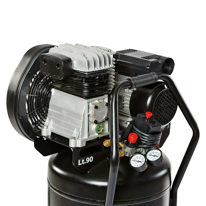 Herkules Pro-Line Compresor B2800B/3M/90 - Presión máx.: 10 bar, 2.200 W, 90 l - Primer plano de un compresor de aire negro con un bloque de motor plateado y dos manómetros para controlar la presión.